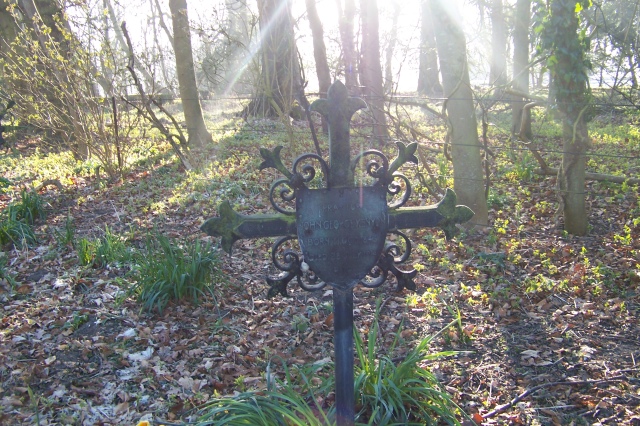 John George Kenyon's grave cross in the churchyard. 